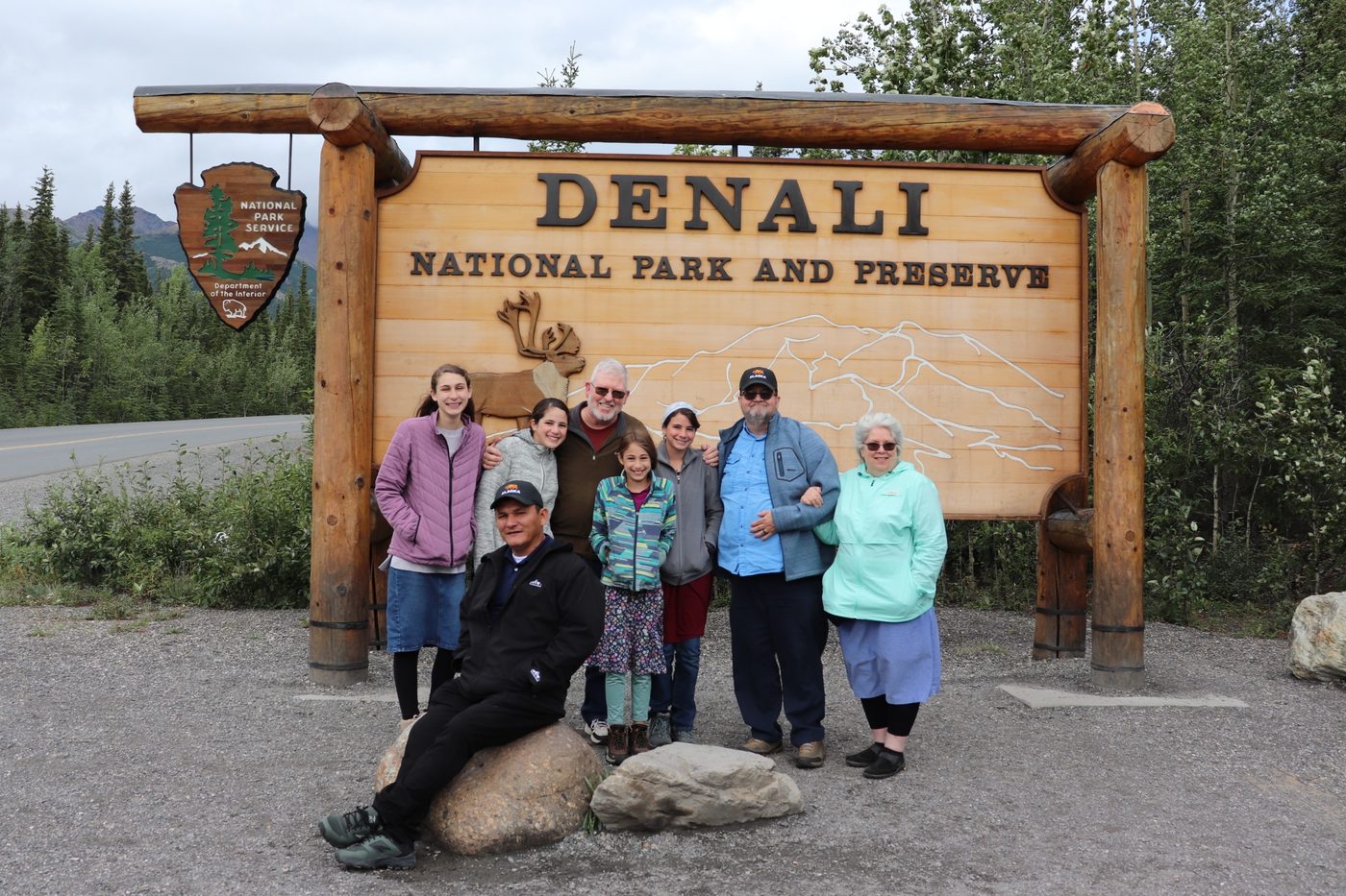 Church members at the Denali National Park sign