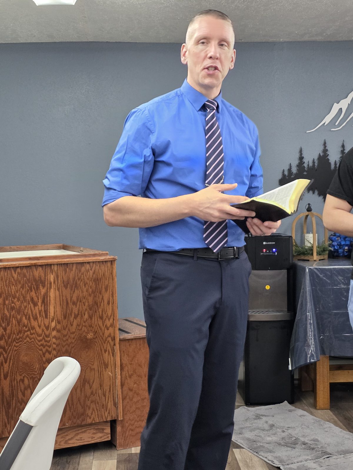 Pastor Phil McBroom preaching from the Bible